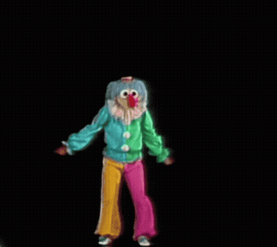 Clown With Red Nose In Green Jacket And Pink Pants GIF