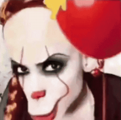 Clown Woman Holding Red Balloon GIF