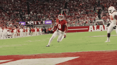 Coach Talking To Football Players In Locker Room GIF