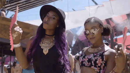Coachella Goers Beat The Heat With Fans GIF
