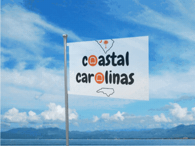 Coastal Carolina Flag Flying In Blue Sky GIF