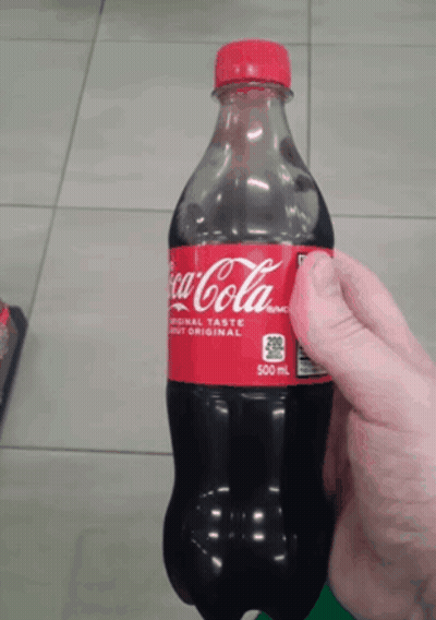 Coca Cola Bottle With Red Cap GIF