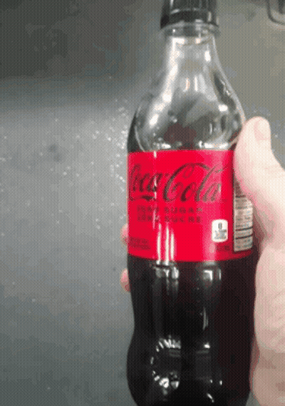 Coca Cola Bottle With Spoon GIF