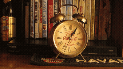Coca Cola Clock On Havana Club Mat GIF