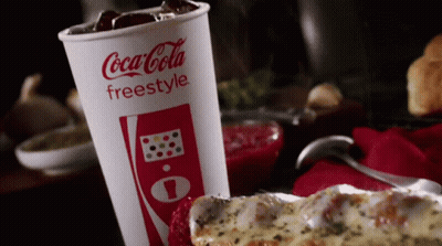 Coca Cola Freestyle Cup Beside Pizza GIF
