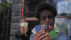 Cocky Black Guy Showing Off Credit Cards GIF