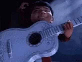 Coco Miguel Playing Guitar Inside Fire GIF