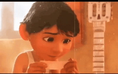 Coco Miguel Reading Something GIF