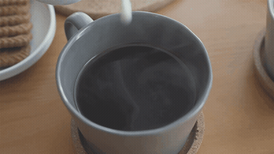Coffee Being Poured With Milk GIF
