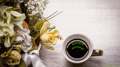 Coffee Cup Beside Flowers Saying Good Morning GIF