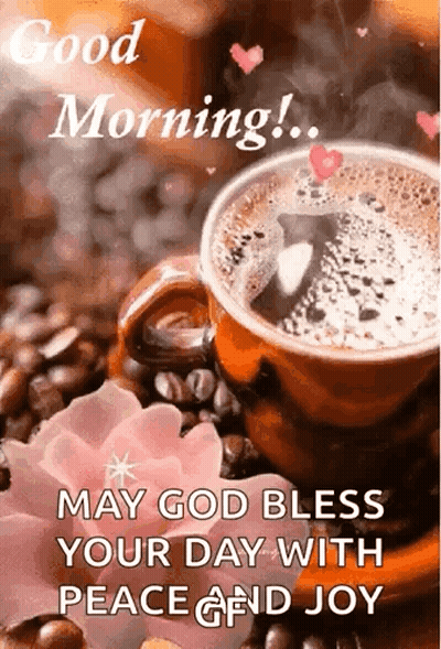 Coffee Cup On Coffee Beans Next To Pink Flower GIF