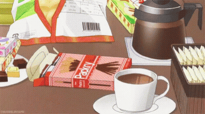 Coffee Cup On Saucer Next To Pocky Box GIF