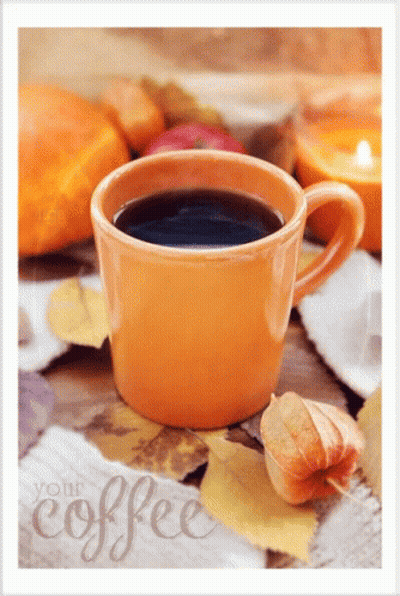 Coffee Cup Surrounded By Autumn Leaves With Your Coffee Sign GIF