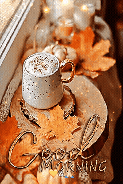 Coffee On Wooden Table With Autumn Leaves And Candles GIF