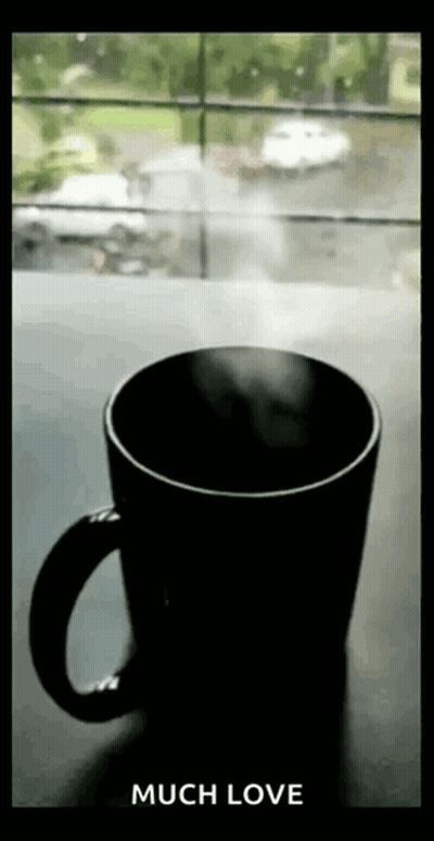 Coffee With Steam Next To Window GIF