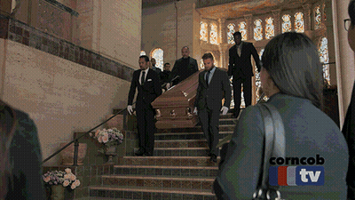 Coffin Carried Up Stairs In Church With Corncob TV GIF
