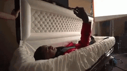 Coffin Inside Red Suit Selfie GIF