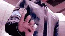 Coin Playing On The Finger GIF