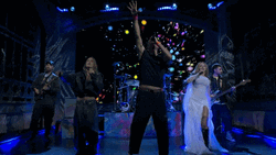 Coldplay Performing With Two Ladies On SNL GIF