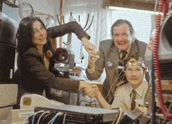 Collaboration Three People Shaking Hands GIF
