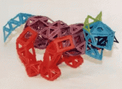 Colorful Cat Toy With Blue Tail GIF