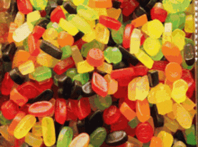 Colorful Gummy Candies Saying Strawberry GIF