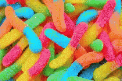 Colorful Gummy Worms In Banana Shape GIF