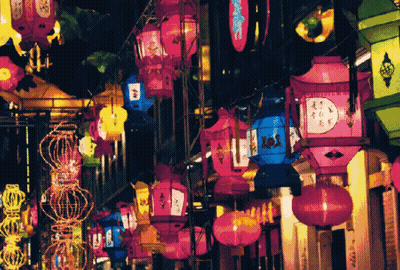 Colorful Lanterns Hanging From Rope GIF