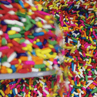 Colorful Sprinkles Being Poured GIF