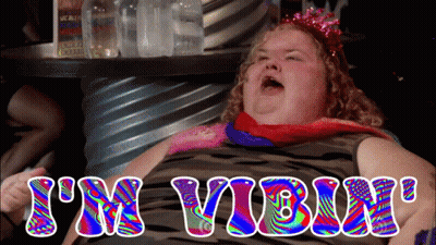 Colorful Woman Saying I'm Vibin GIF