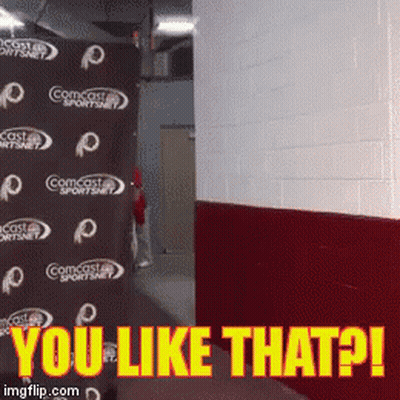 Comcast Sportsnet Sign Behind A Wall GIF