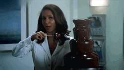 Comedian Maya Rudolph Sensual Licking Chocolates GIF