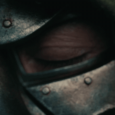 Comic Book Character With Green Cape Looking At Mirror GIF