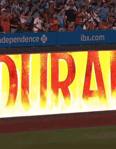 Commanders Football Player Standing In Front Of Crowd GIF