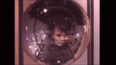 Comme Des Garçons PLAY Logo With Three Red Hearts GIF