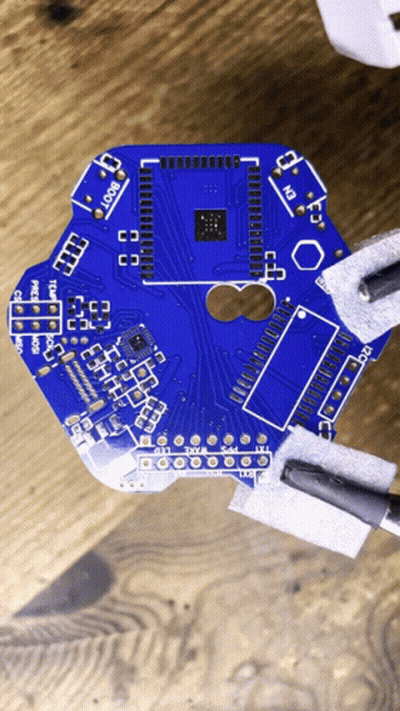Computer Chip Surrounded By Squares GIF