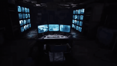Computer Desk Three Monitors Keyboard Mouse Game Controller GIF