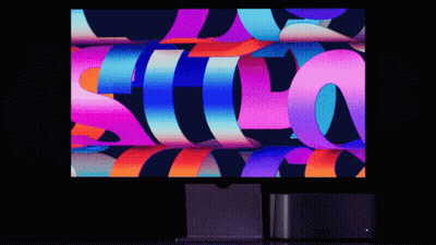 Computer Monitor Displaying Colorful Letter S GIF
