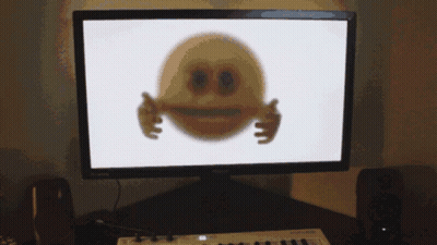 Computer Monitor Displaying Smiley Face With 89 GIF