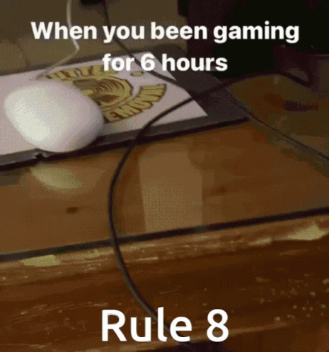 Computer Mouse On Desk Next To Rule 8 GIF