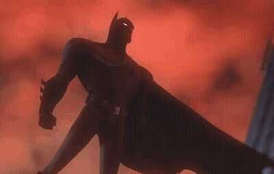 Computer Screen With Silhouette Of Man In Cape GIF