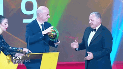 Confederation Of African Football Awarding Smile And Wave GIF