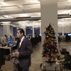 Confused Actor John Travolta Looks Back GIF