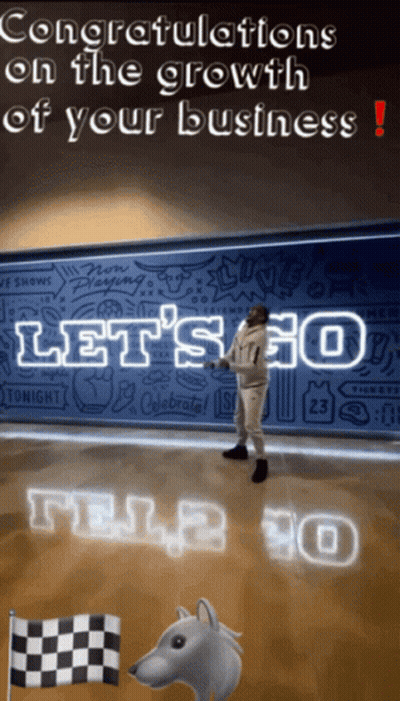 Congratulations On The Growth Of Your Business With A Man Standing In Front Of A Wall GIF
