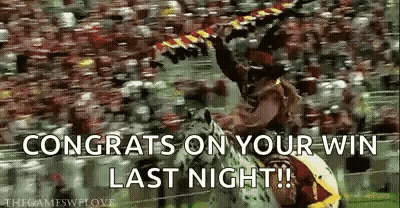 Congratulations On Your Win Last Night ! A Man Is Riding A Horse In Front Of A Crowd . GIF