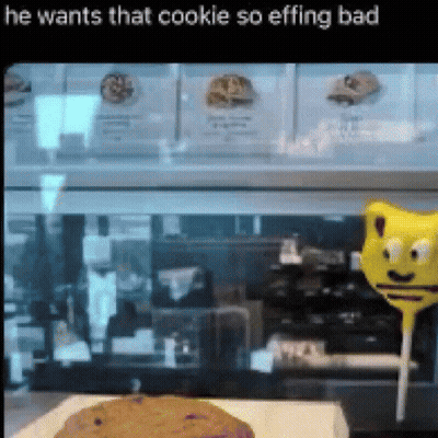 Cookie In Display Case He Wants That Cookie So Effing Bad GIF