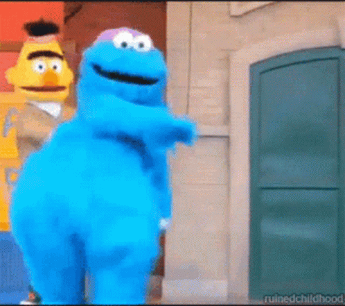 Cookie Monster And Bert Standing Next To Each Other In Front Of Door GIF