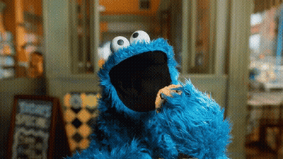 Cookie Monster Eating Cookie By Window GIF