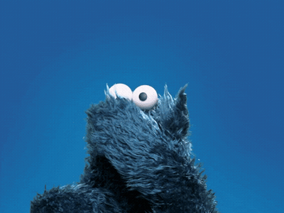 Cookie Monster From Sesame Street Looks Up At The Sky With His Mouth Open GIF