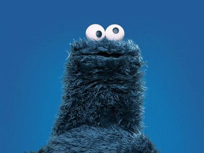 Cookie Monster From Sesame Street Looks Up Into The Sky GIF